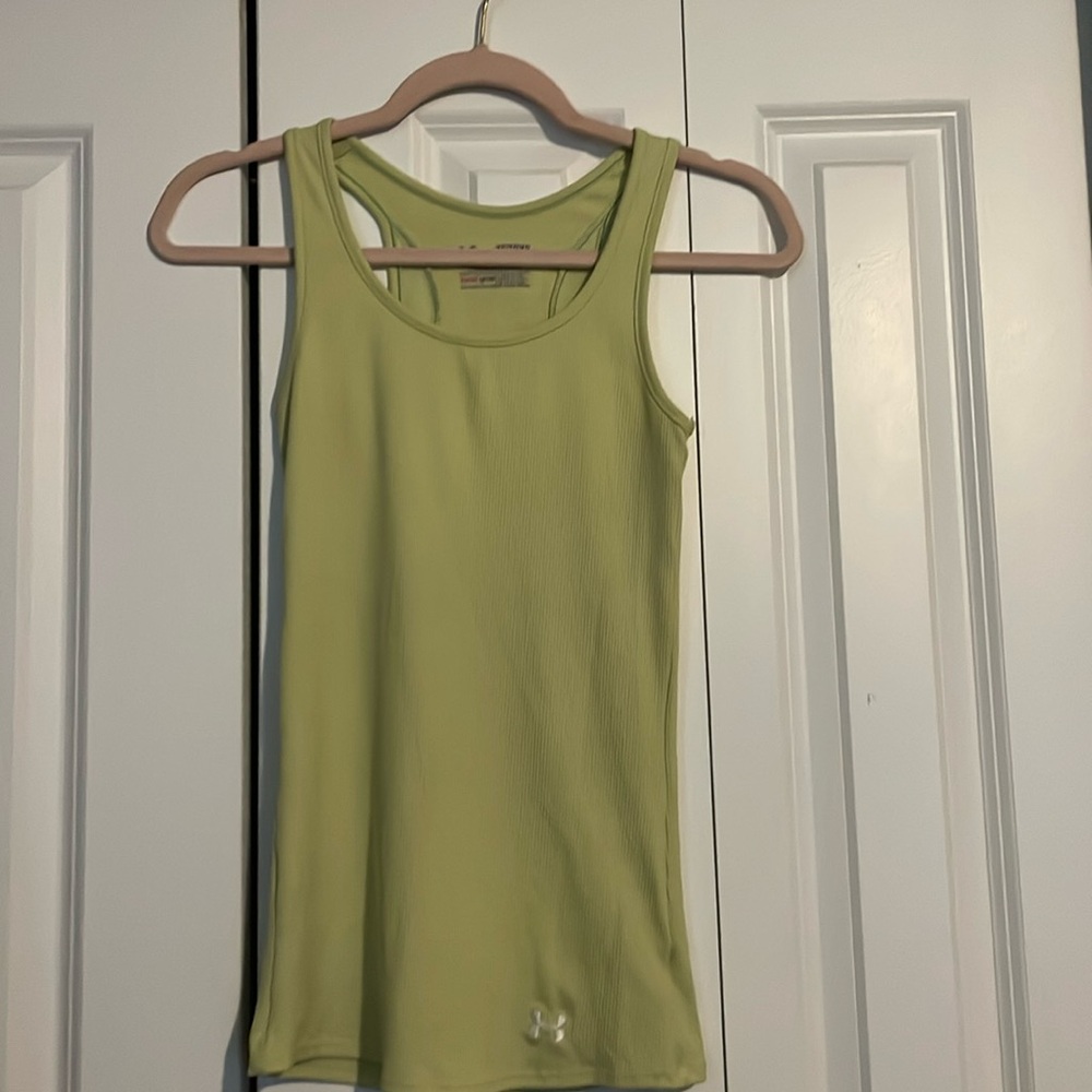 A neon green under armor tank top, perfect for any outdoor activities